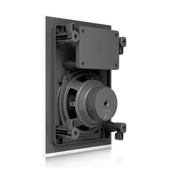 Rear view of the Ubiquiti UACC-In-Wall-Speaker showing the woofer assembly and in-wall mounting clamps