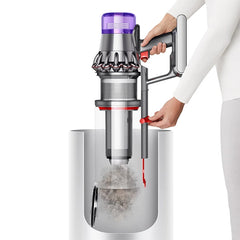Dyson Outsize Extra cordless vacuum dust bin being emptied hands-free
