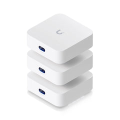 Ubiquiti UX7-3 WiFi 7 mesh system with three Express 7 units stacked together